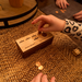 Penny Drop is our most popular family game. It can be played with 2 - 10 players of all ages. This is our travel game version.